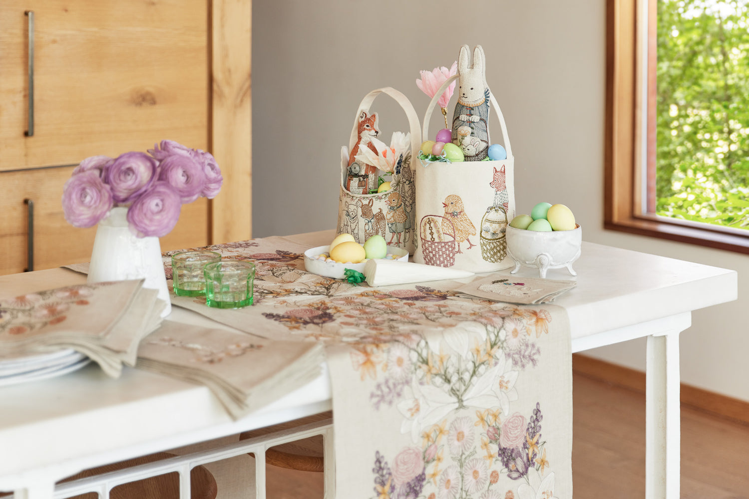 Coral & Tusk Easter baskets on a spring table