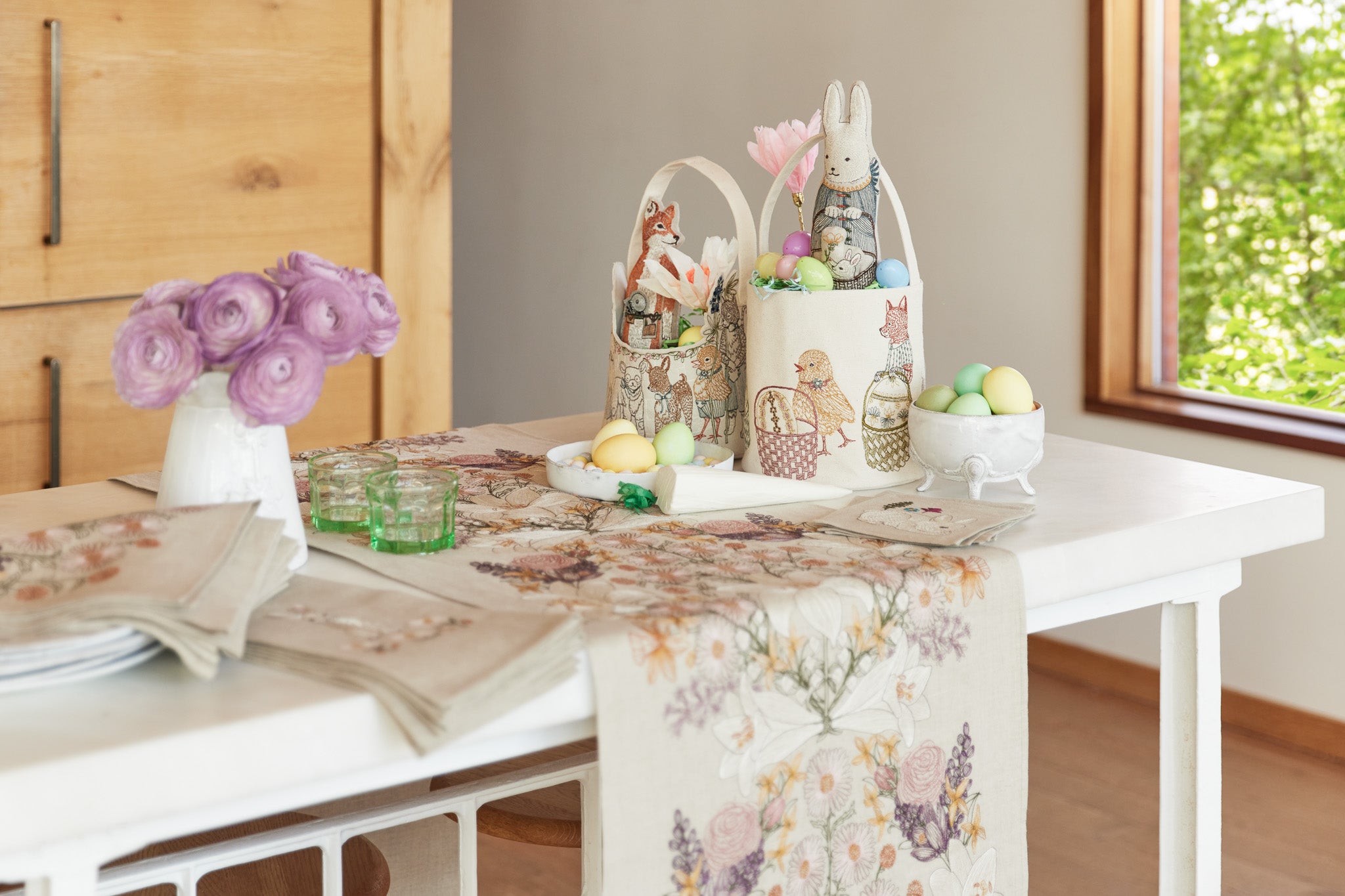 Coral & Tusk Easter baskets on a spring table