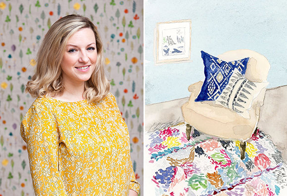Photograph of Lynsey Hirth beside her watercolor illustration of chair with Coral and Tusk geometric pillows and colorful rug.