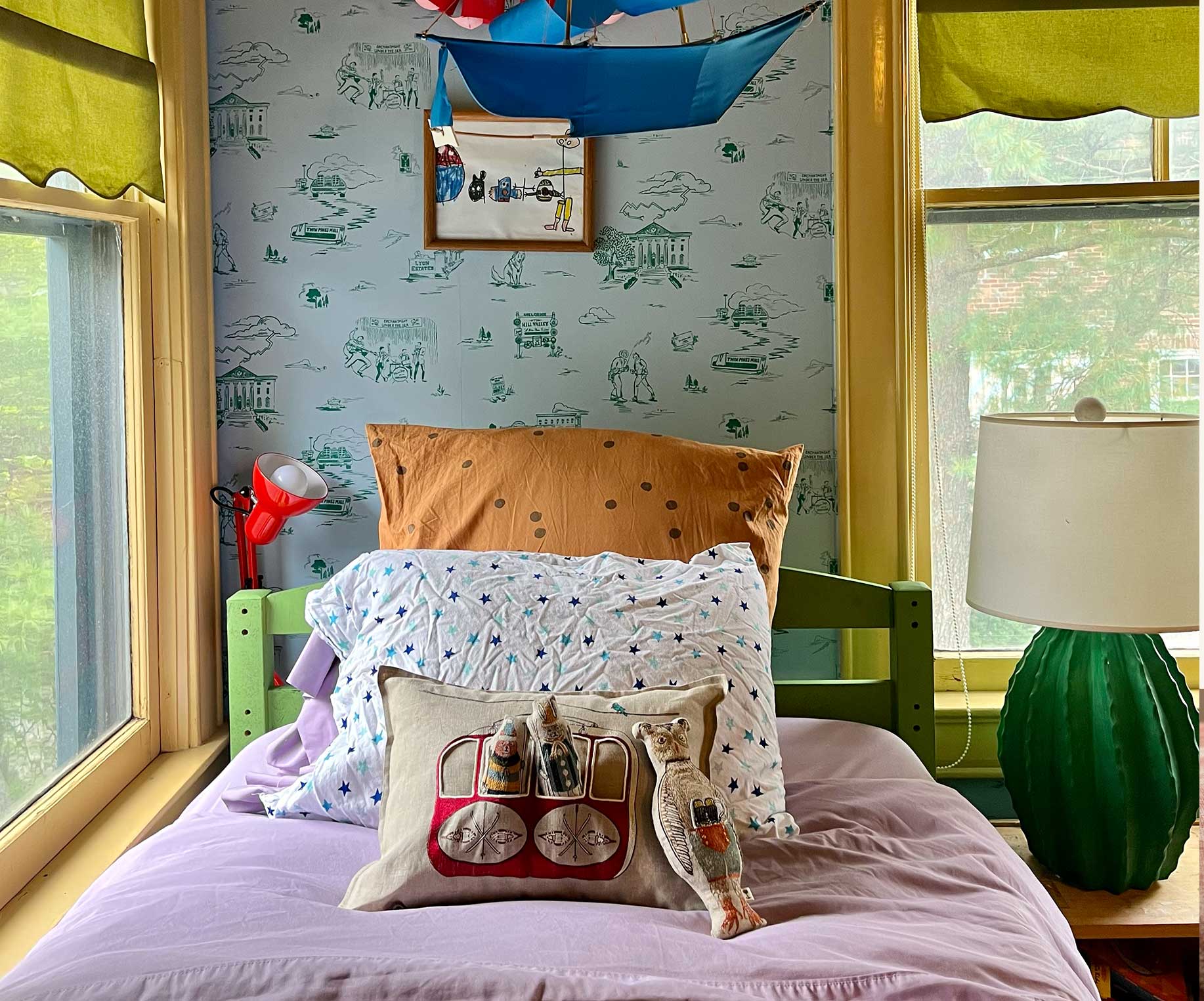 Coral & Tusk Gondola Pocket Pillow in a colorful kids room