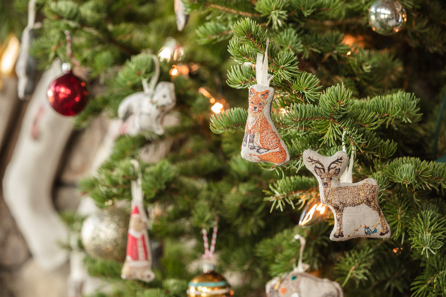 Coral & Tusk ornaments on a tree
