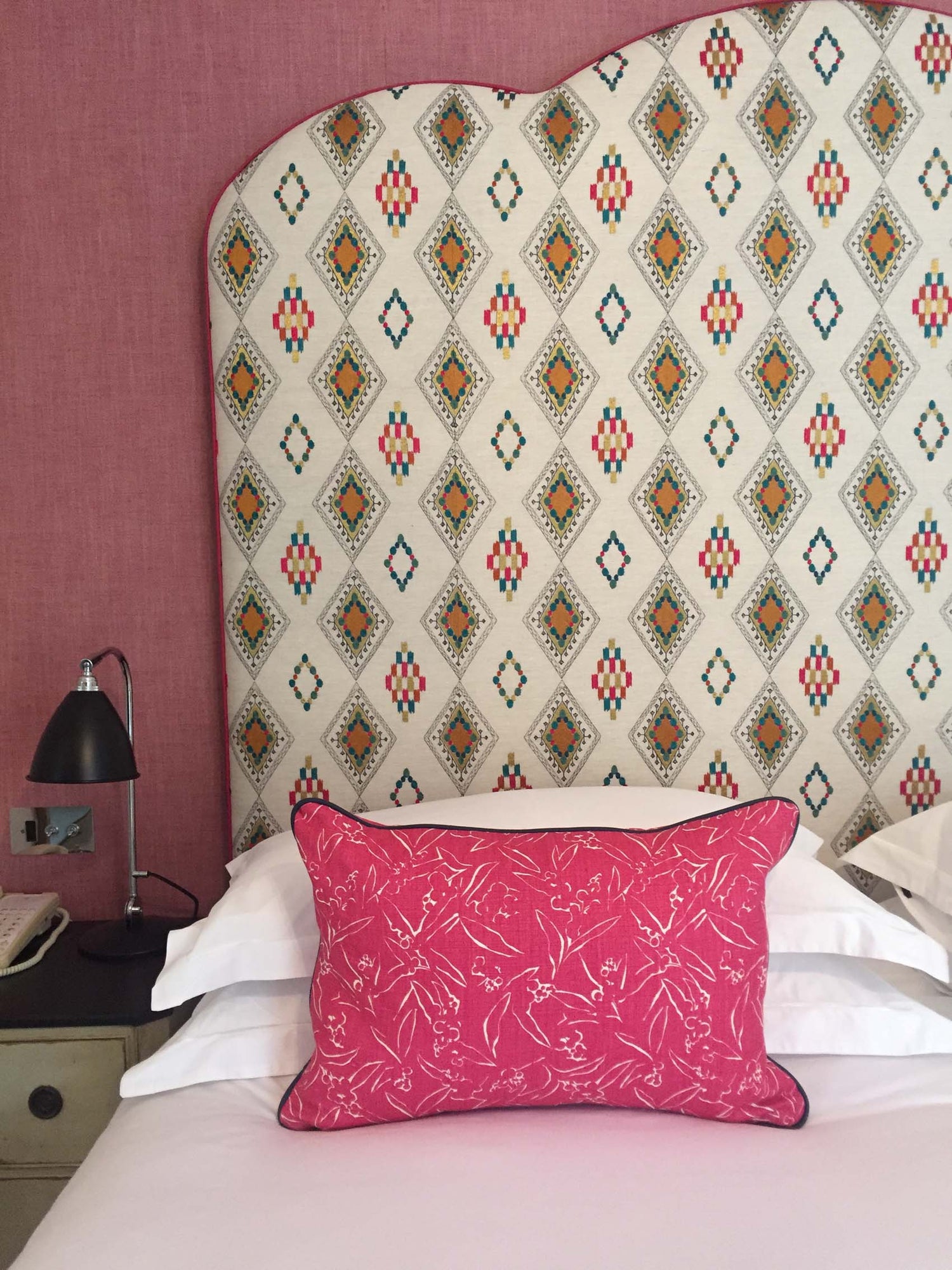 Firmdale's Soho Hotel with Coral & Tusk embroidered fabric as a headboard