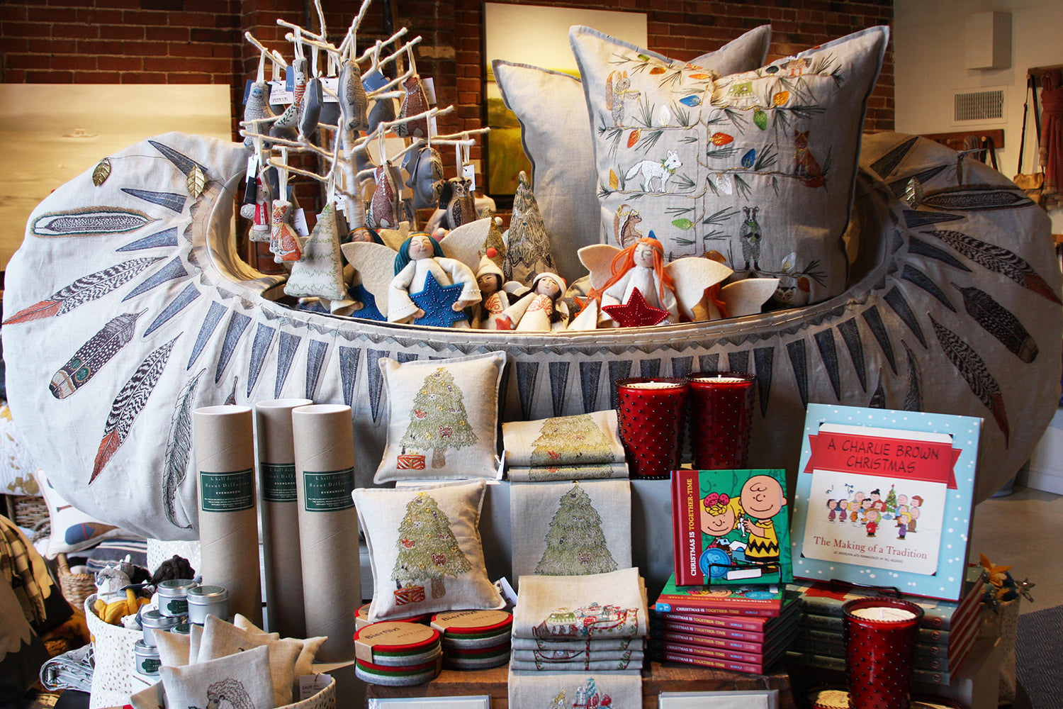 Display of Coral and Tusk Canoe, pillows, and other gifts at K Collette in Portland, Maine.