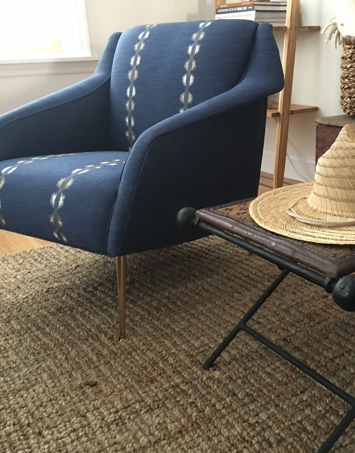 Chair upholstered in Coral & Tusk embroidered indigo linen fabric.
