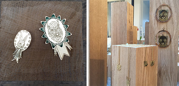 Coral and Tusk x Titlee jewelry display on wood blocks at KID show in Paris.