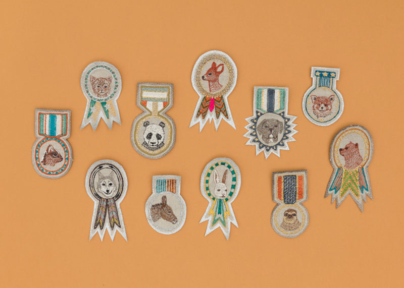Grouping of all embroidered pin badges