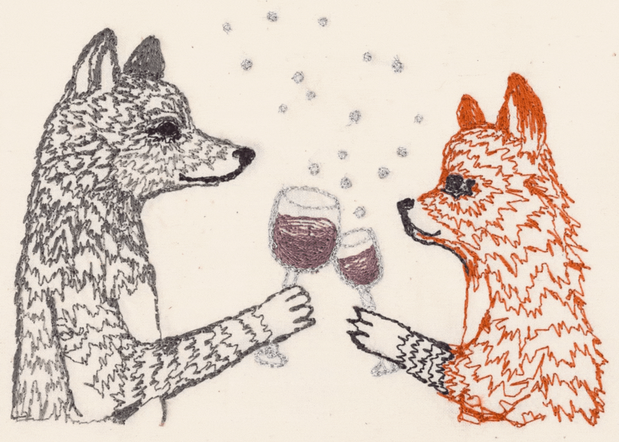 Gif of an embroidered wolf and fox cheers-ing