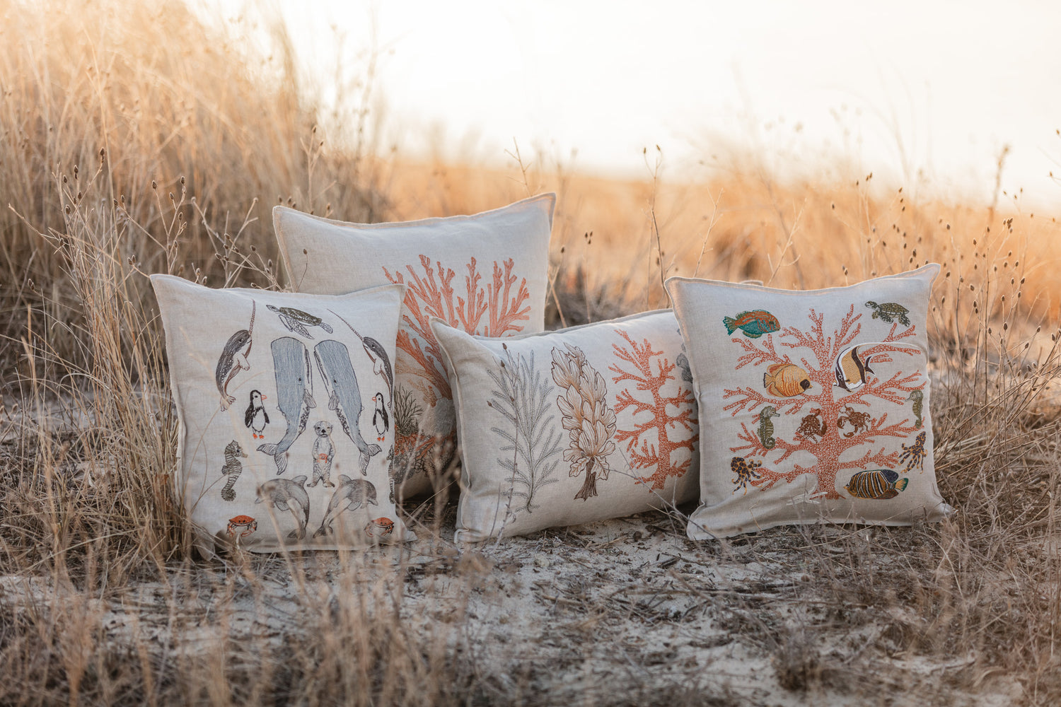 Coral & Tusk coastal pillows on the sand dunes