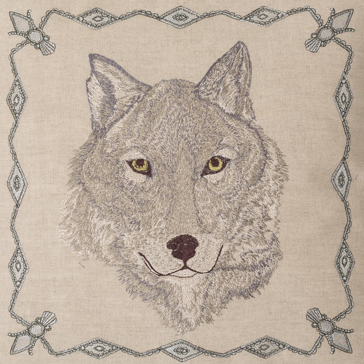 Photo of wolf drawing and embroidery