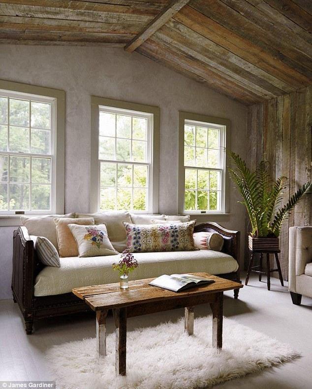 Image of sunroom and sofa with Coral and Tusk embroidered botanical pillows from Daily Mail online feature.