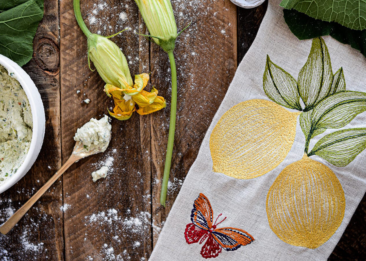 Coral & Tusk tea towel on a kitchen counter