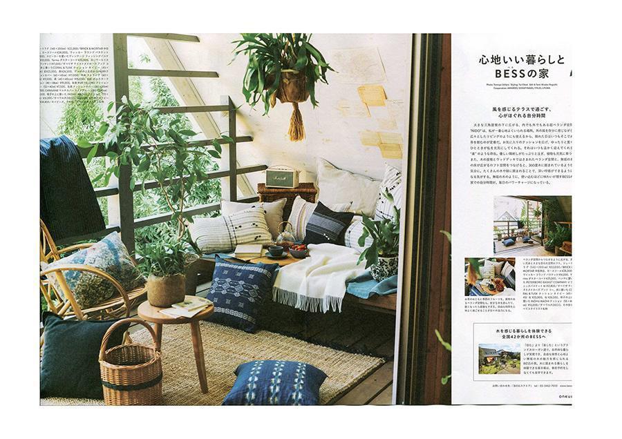Okul magazine article featuring interior couch with Coral and Tusk embroidered indigo pillows.