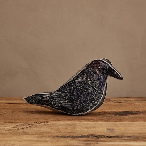 Coral & Tusk Blackbird of Mystery three-dimensional decorative embroidered felt bird with detailed feather stitching on all sides.