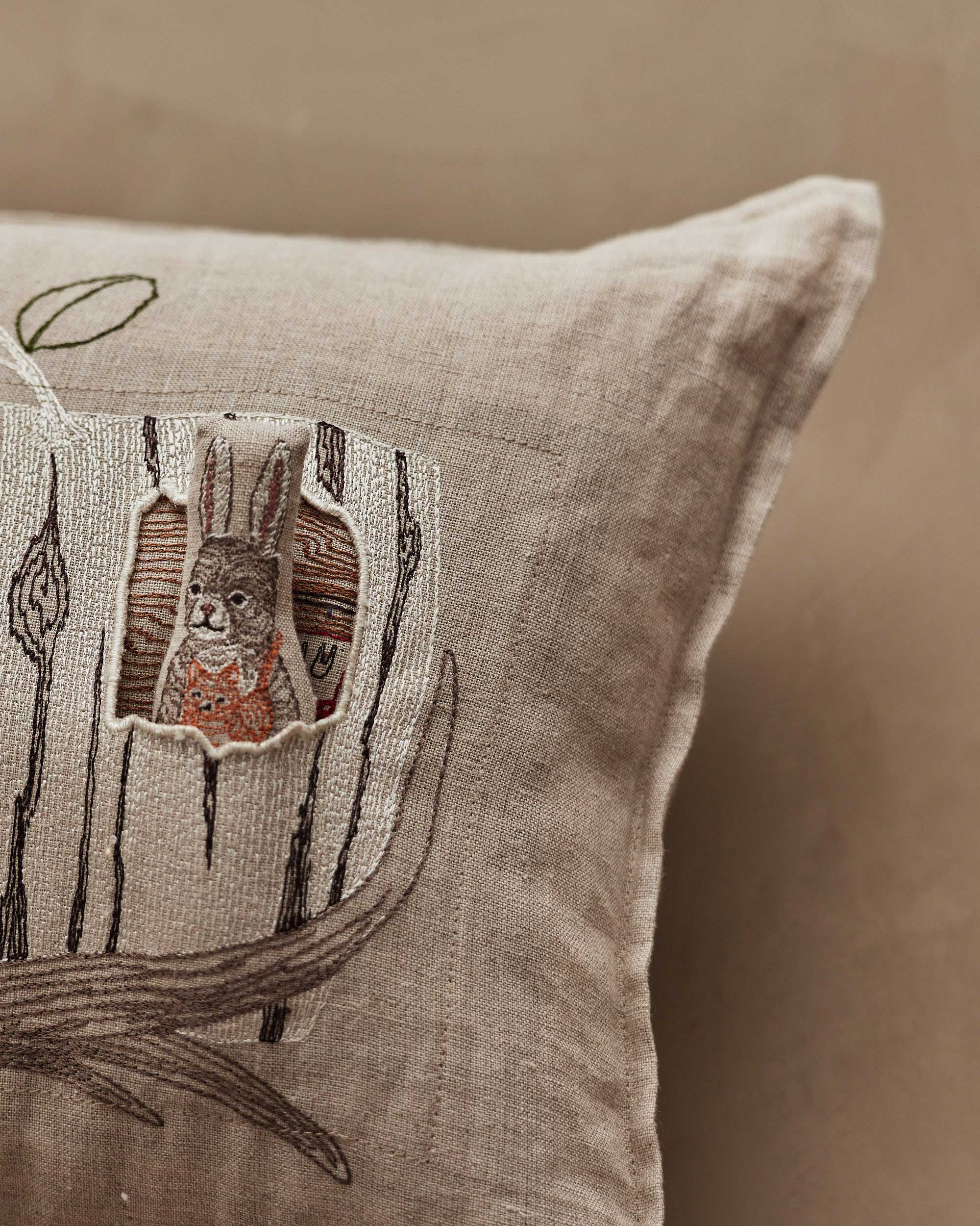 Aspen Log Bunnies Pocket Pillow | Coral & Tusk