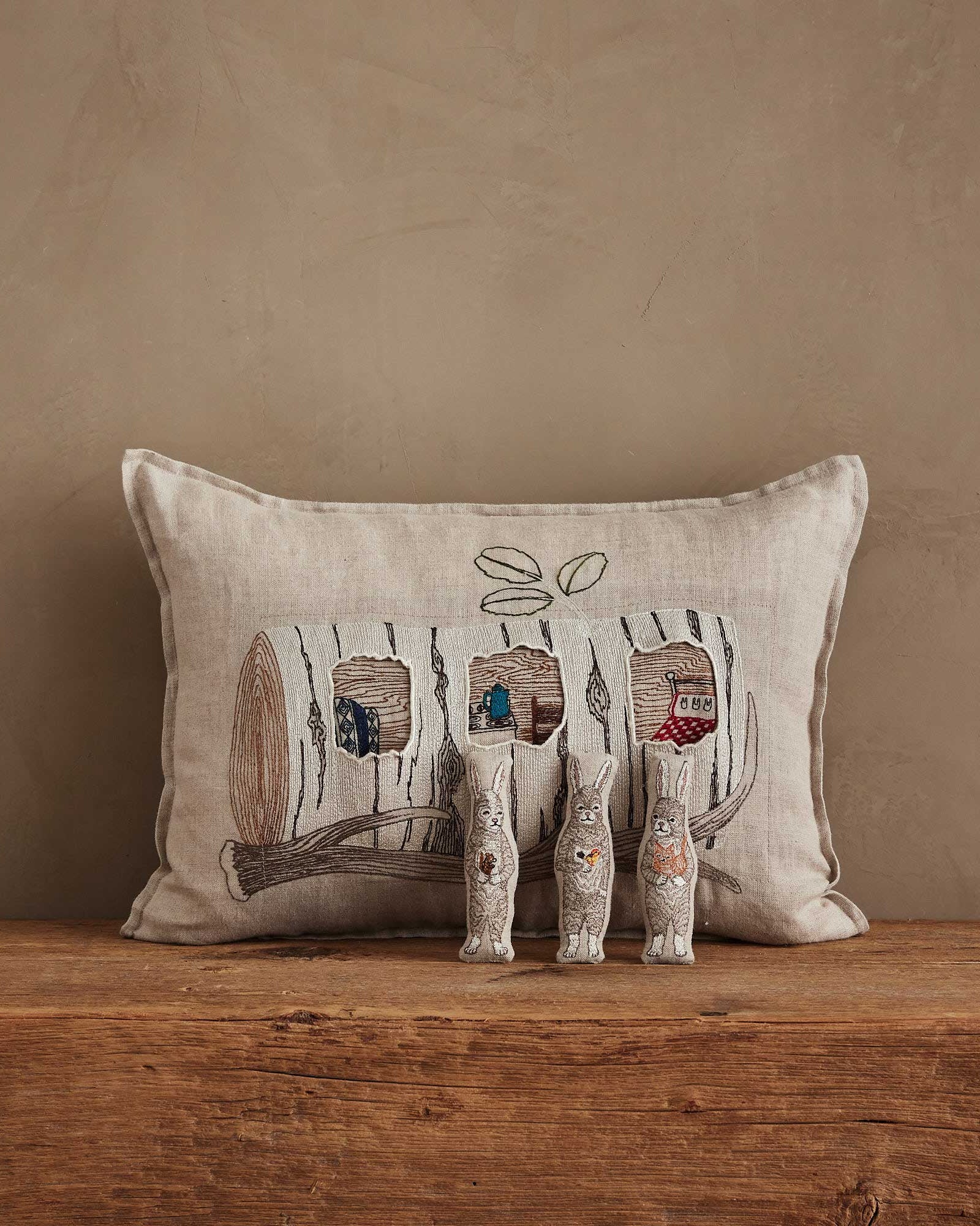 Aspen Log Bunnies Pocket Pillow