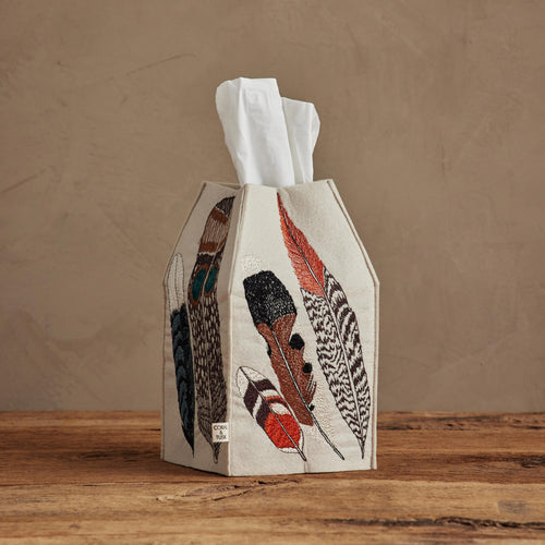 Coral & Tusk Feathers Tissue Box Cover with embroidered bird feathers on each side.