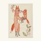 The Seconds Sale Fox Mama Card features an embroidered mother fox and her kit facing each other against a cream background with pink flowers and green leaves, detailed with textured orange thread and intricate stitched patterns.