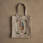 Coral & Tusk embroidered ABC Tote Bag with embroidered ABC letters, fox, bear and bunny animals on natural linen with pocket.
